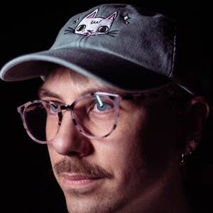 Cat face embroidered washed sage green vintage style baseball cap