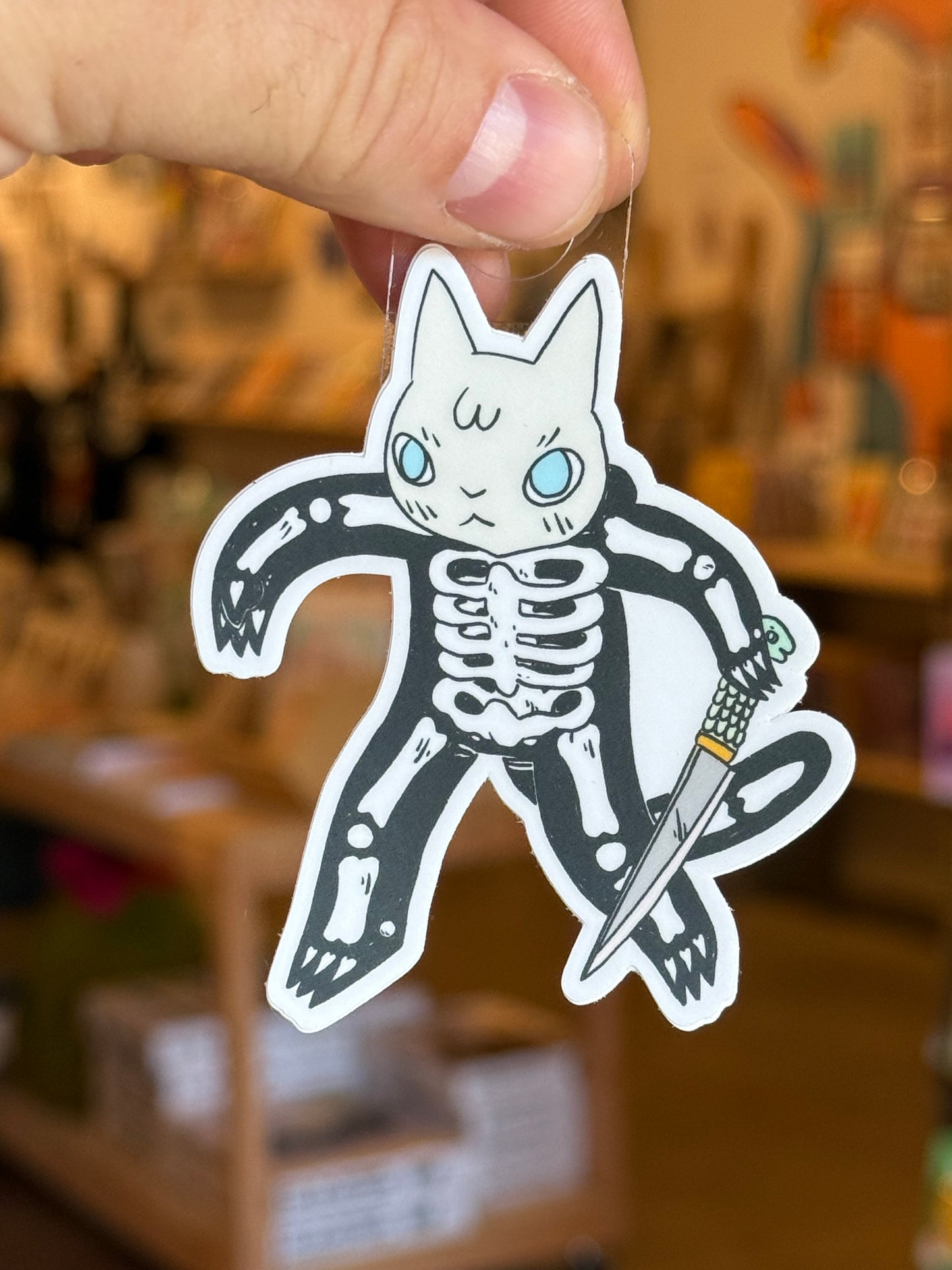 Cat in Skelton suit sticker by Deth P Sun