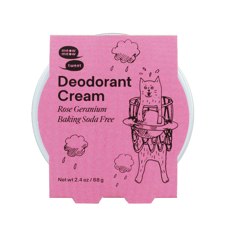 Pink packaging of deodorant cream with cat illustration on a white background