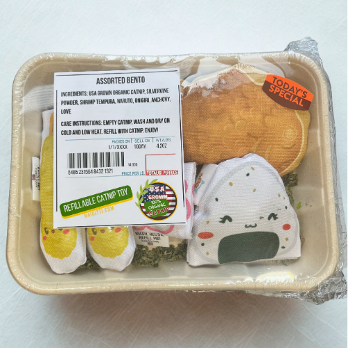 Assorted bento cat toy set in a packaging tray with a label on a white background