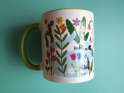 Colourful cats with flowers illustrated coffee mug