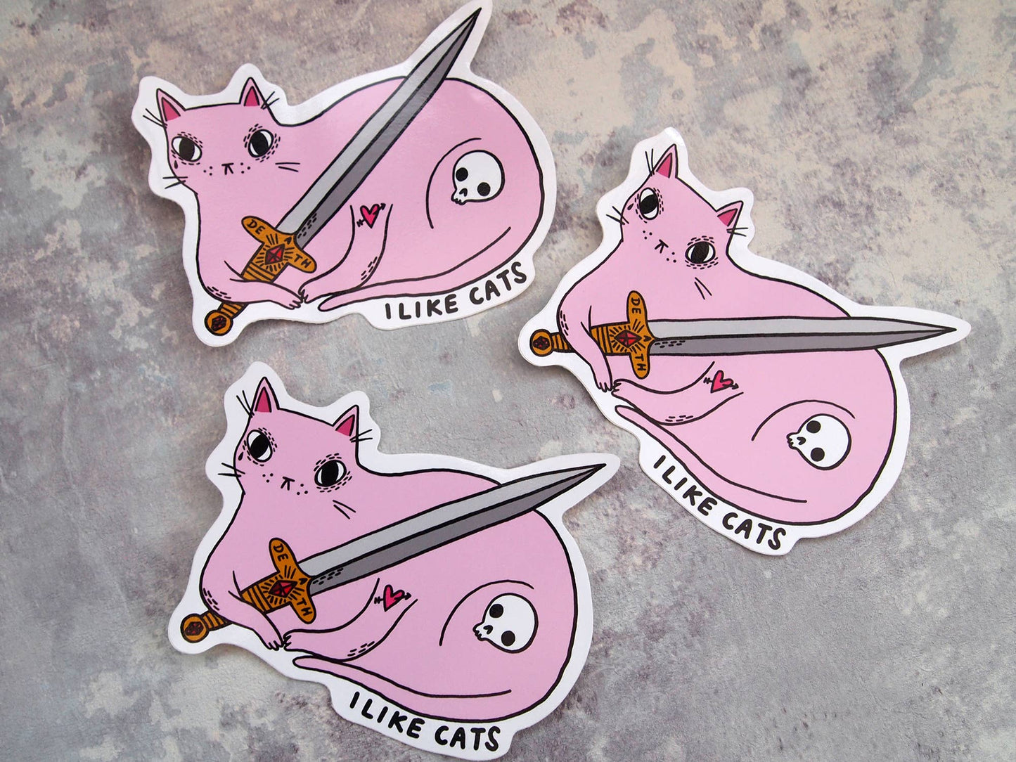 Pink cat with sword illustrated vinyl sticker