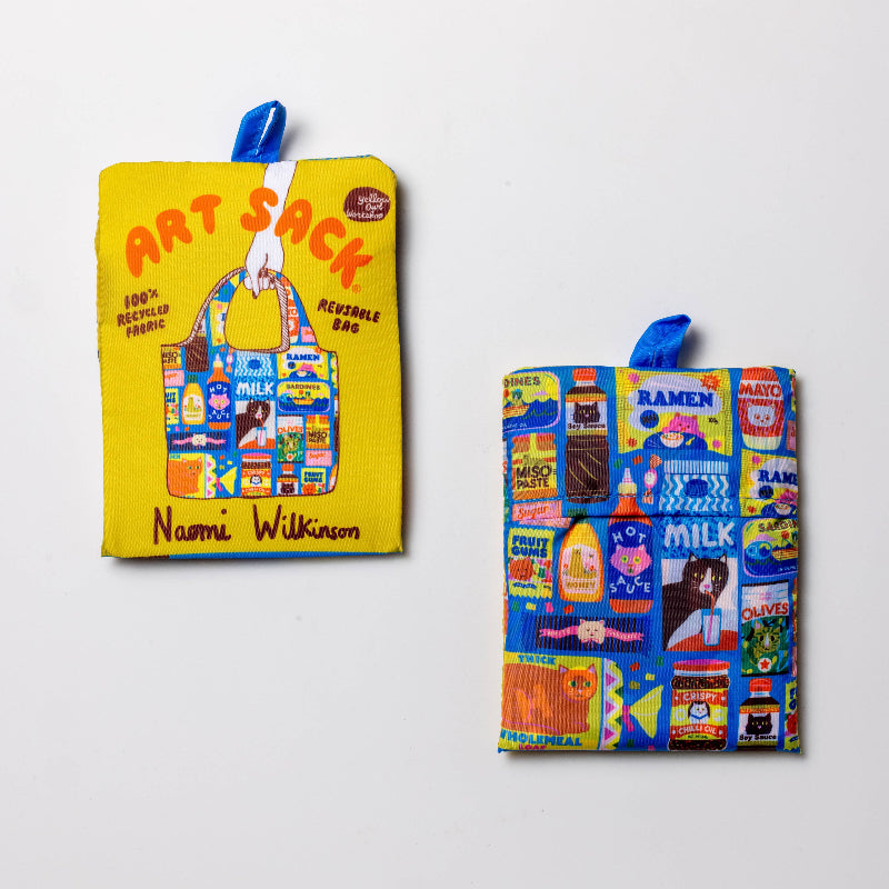 Colorful reusable bags with a 'Art Sack' label on a white background