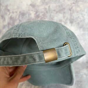 Cat face embroidered washed sage green vintage style baseball cap
