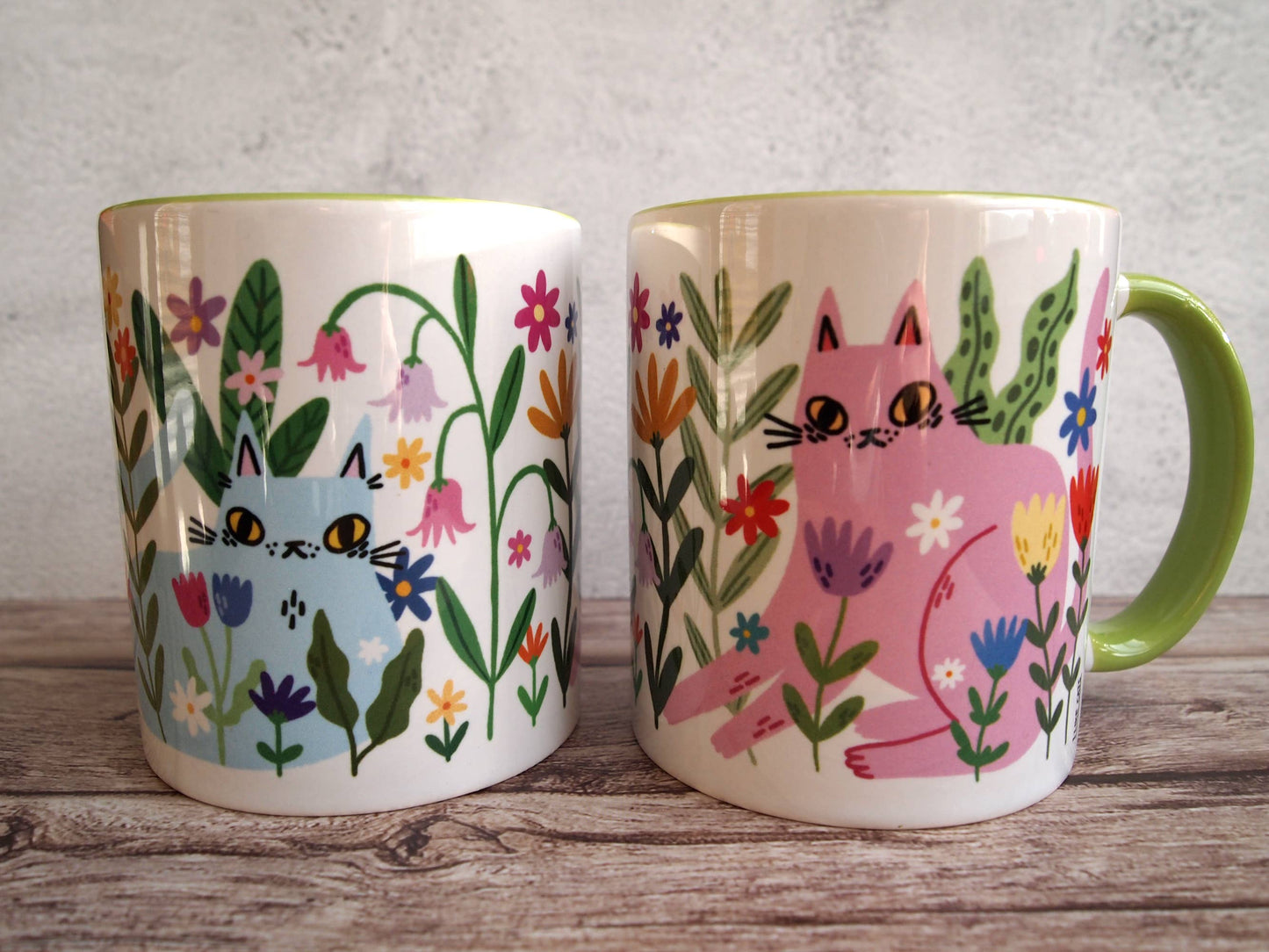 Colourful cats with flowers illustrated coffee mug