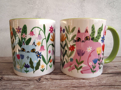 Colourful cats with flowers illustrated coffee mug