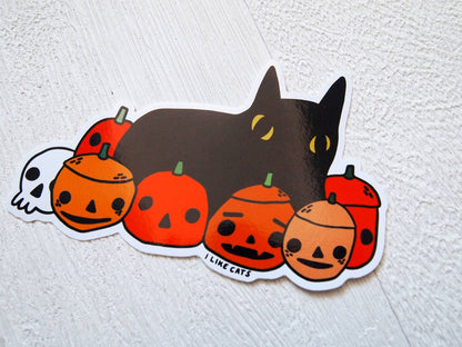 Black cat with pumpkins illustrated vinyl sticker