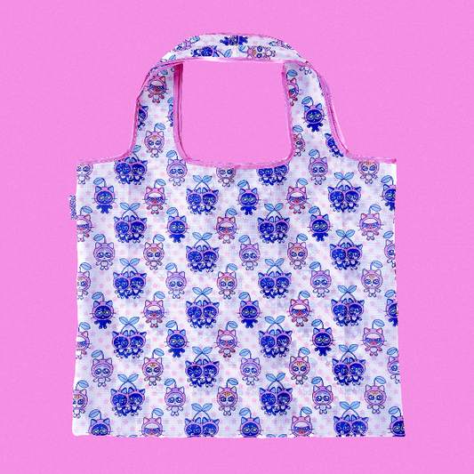 Reusable shopping bag with cartoon character pattern on a pink background