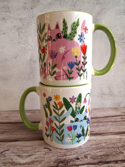 Colourful cats with flowers illustrated coffee mug