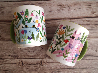Colourful cats with flowers illustrated coffee mug