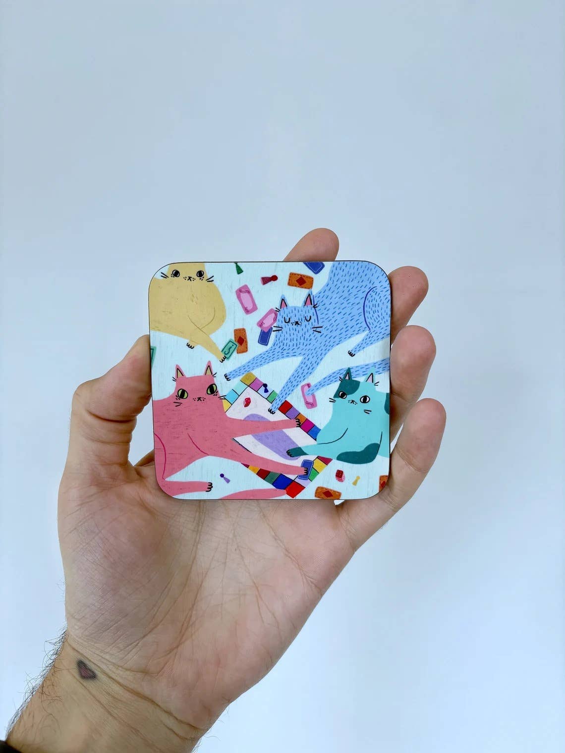 Cats playing board games illustrated drinks coaster