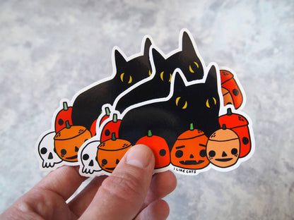 Black cat with pumpkins illustrated vinyl sticker