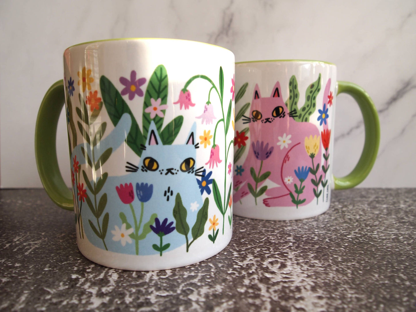 Colourful cats with flowers illustrated coffee mug