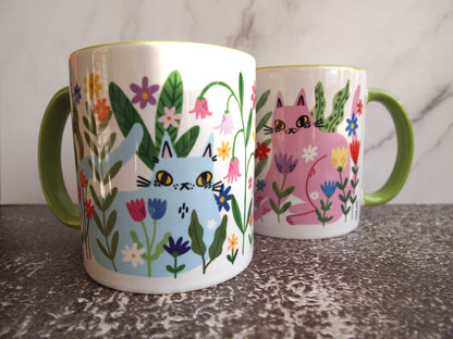 Colourful cats with flowers illustrated coffee mug
