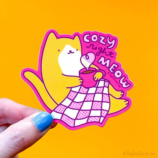 Orange Cat Vinyl Sticker "Cozy Right Meow"