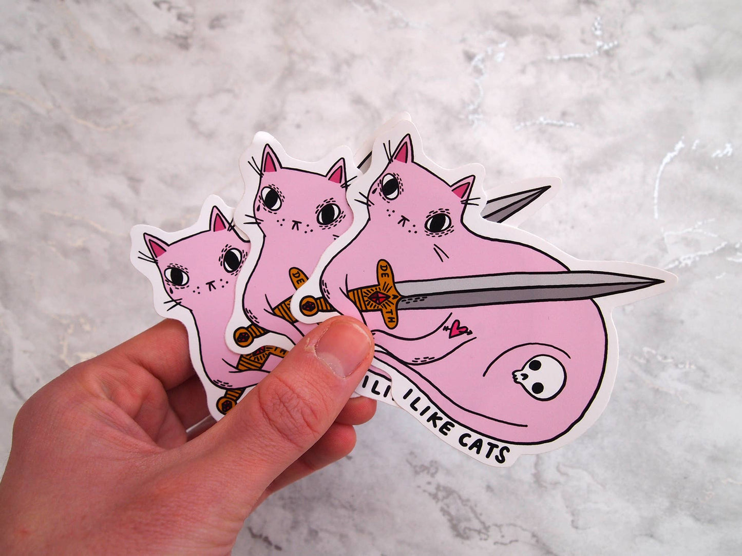 Pink cat with sword illustrated vinyl sticker