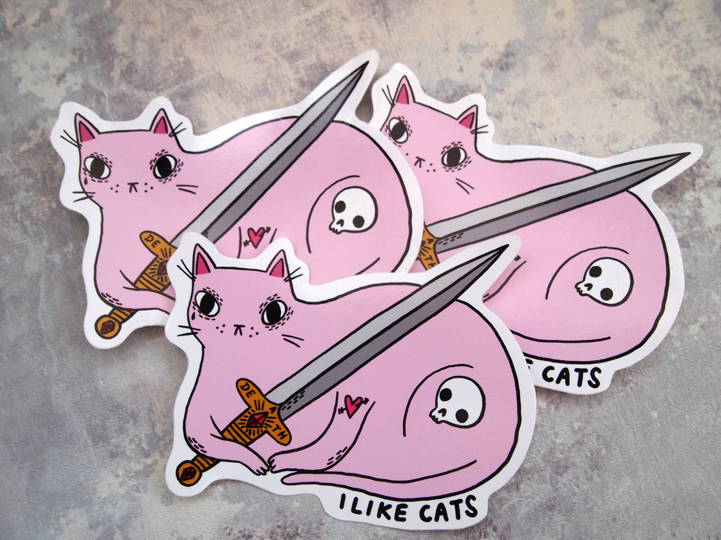 Pink cat with sword illustrated vinyl sticker