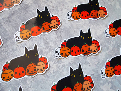 Black cat with pumpkins illustrated vinyl sticker