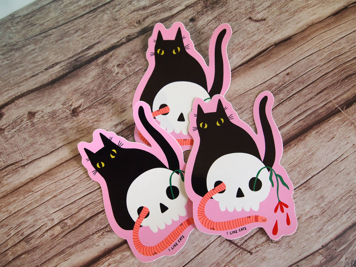 Black cat with skull illustrated vinyl sticker